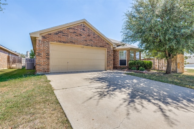 view of front of property featuring a garage and a front yard