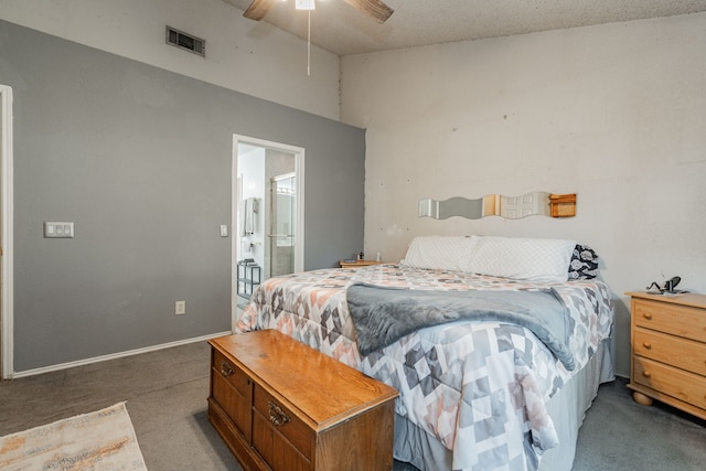 carpeted bedroom with connected bathroom, a textured ceiling, and ceiling fan