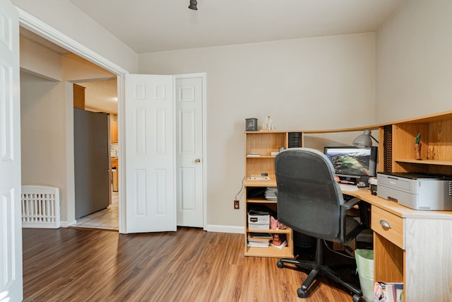 office space featuring wood-type flooring