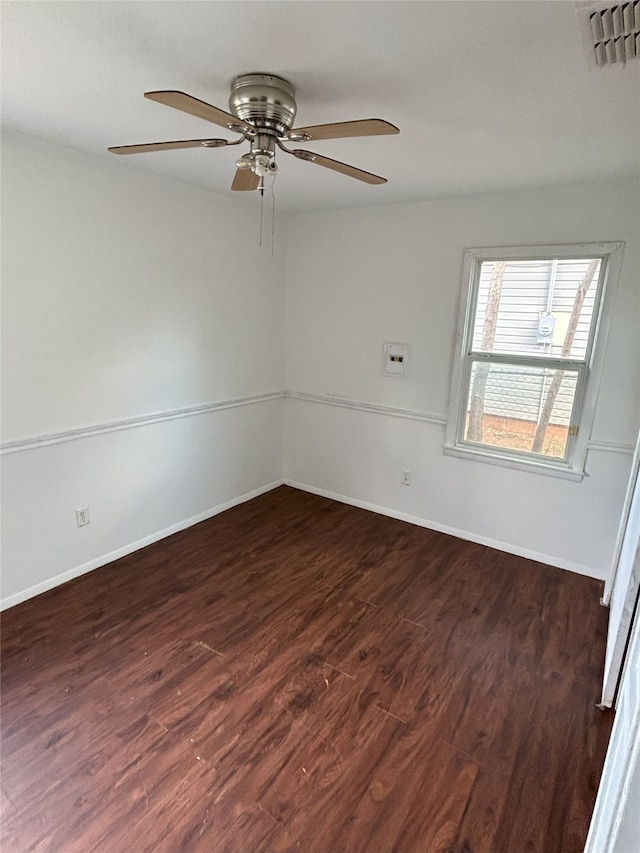 unfurnished room featuring ceiling fan and dark hardwood / wood-style floors