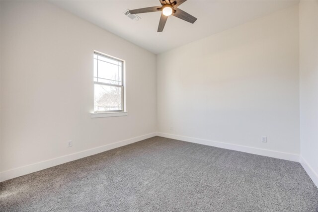 unfurnished room with carpet flooring and ceiling fan