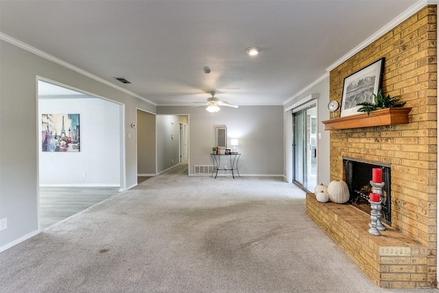 living room featuring carpet flooring, ceiling fan, crown molding, and a brick fireplace