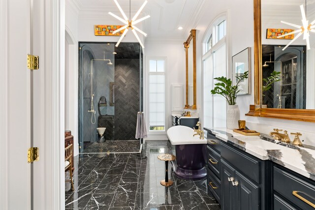 bathroom featuring vanity, an inviting chandelier, ornamental molding, and separate shower and tub