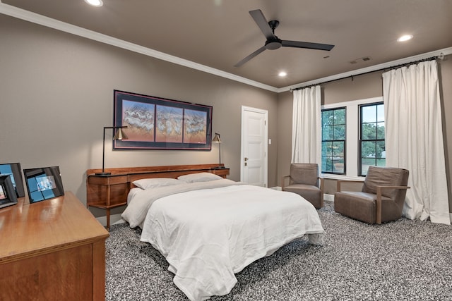 bedroom with crown molding, carpet floors, and ceiling fan