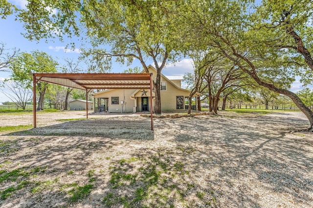 exterior space featuring a carport