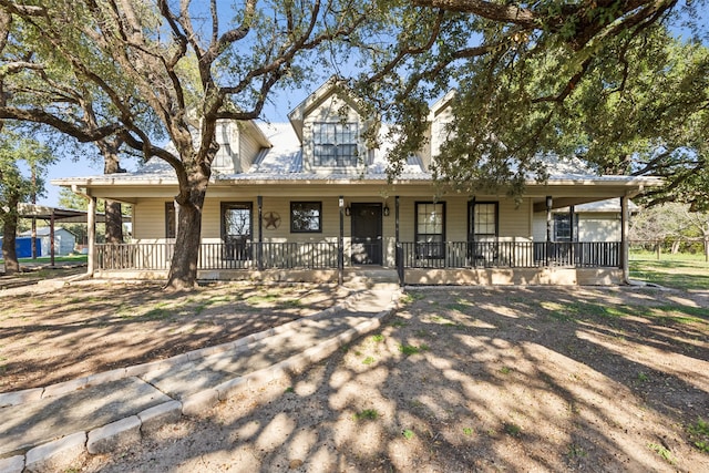 view of front of home featuring covered porch