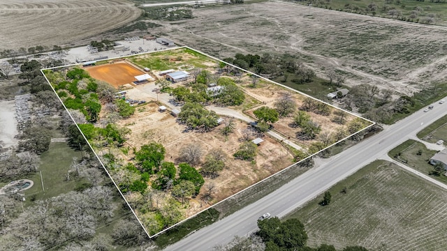 birds eye view of property featuring a rural view