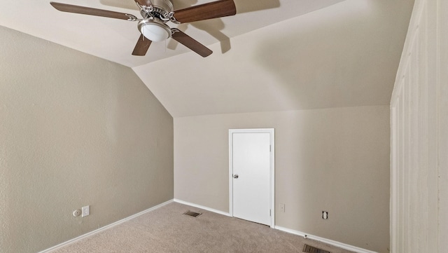 bonus room featuring vaulted ceiling, carpet, and ceiling fan