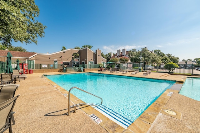 view of pool featuring a patio area