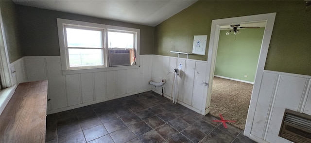 laundry area featuring electric panel, dark carpet, cooling unit, and ceiling fan