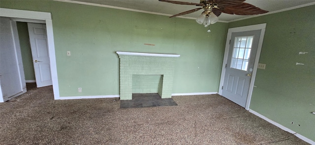 unfurnished living room with a fireplace, ornamental molding, carpet flooring, and ceiling fan