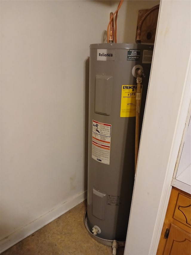 utility room with electric water heater