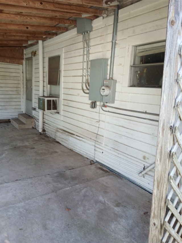 view of side of home featuring a patio area