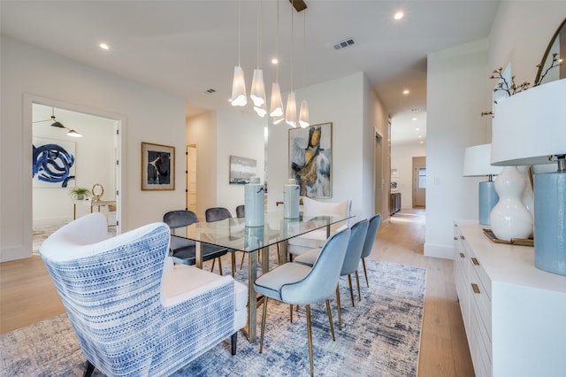 dining space featuring light hardwood / wood-style floors