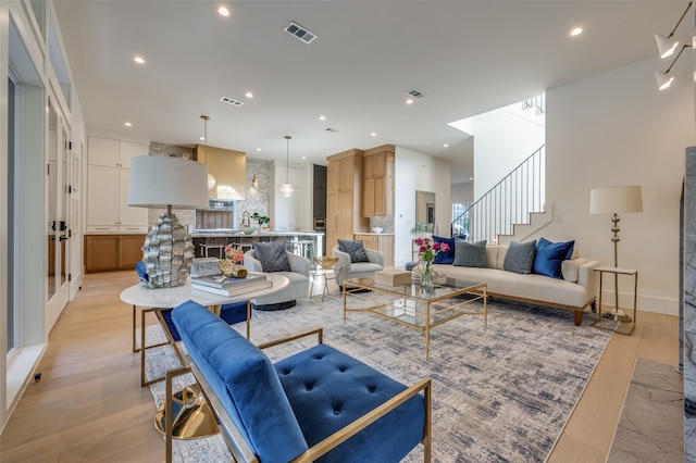 living room featuring light wood-type flooring