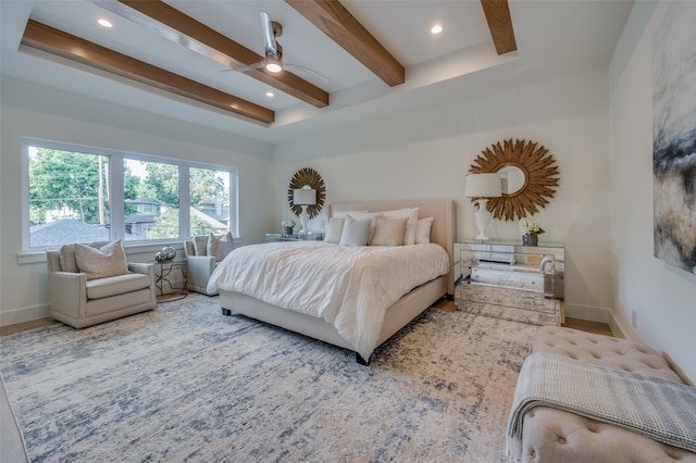 bedroom with beam ceiling and ceiling fan