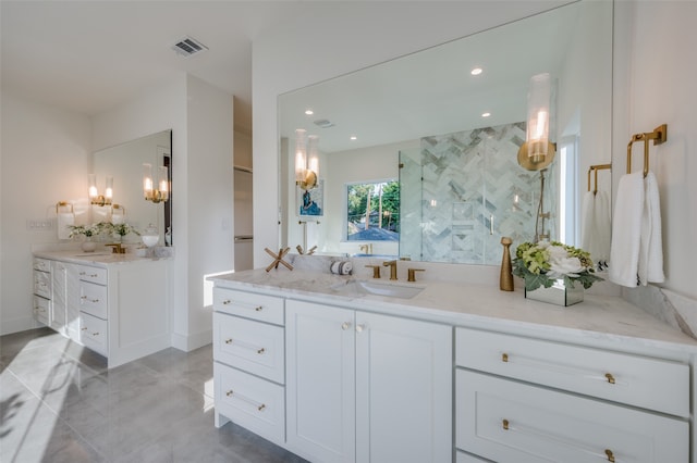 bathroom featuring vanity and a shower