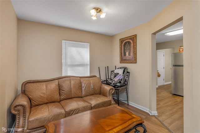 living room with light hardwood / wood-style floors