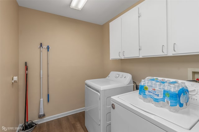 laundry room with separate washer and dryer, dark hardwood / wood-style floors, and cabinets