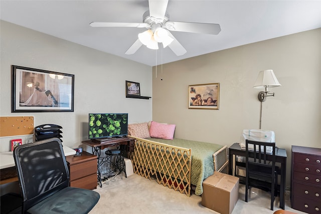 bedroom with light carpet and ceiling fan