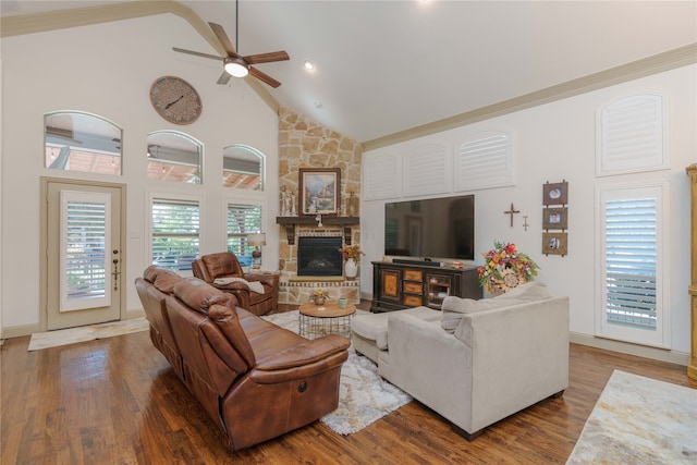 living room with ceiling fan, wood-type flooring, a fireplace, and high vaulted ceiling