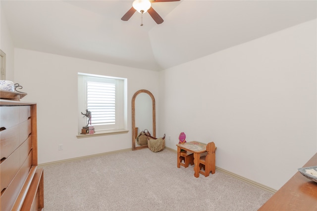 game room featuring light carpet, ceiling fan, and vaulted ceiling