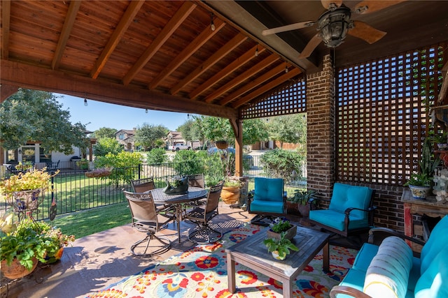 view of patio with ceiling fan and outdoor lounge area