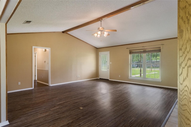 spare room with dark hardwood / wood-style floors, lofted ceiling with beams, a textured ceiling, and ceiling fan