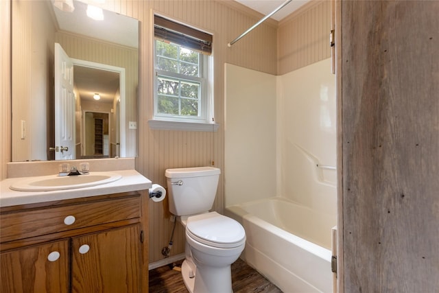 full bathroom featuring bathtub / shower combination, hardwood / wood-style floors, vanity, and toilet