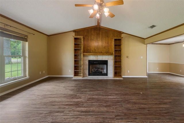 unfurnished living room with ceiling fan, lofted ceiling, dark hardwood / wood-style floors, and crown molding