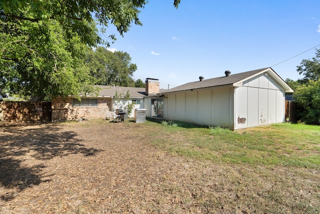 exterior space with a yard