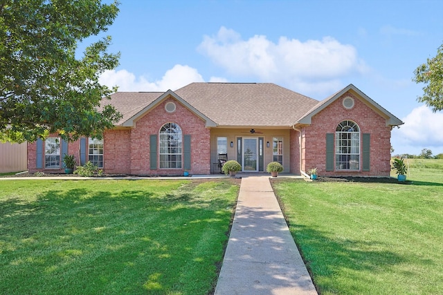 ranch-style house with a front lawn