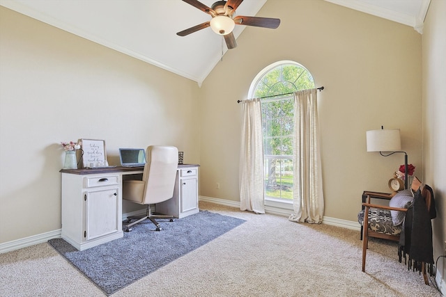 home office with ceiling fan, light colored carpet, ornamental molding, and high vaulted ceiling