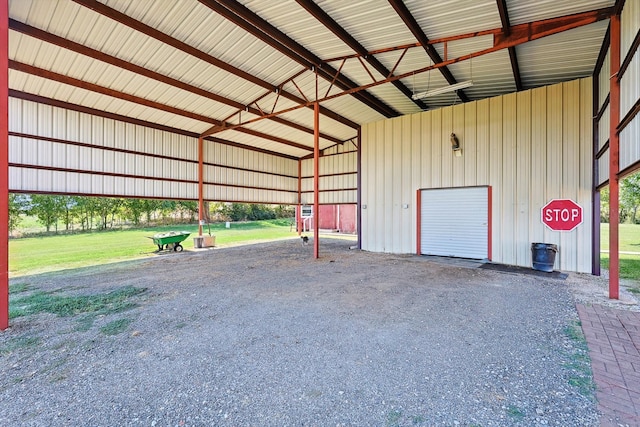 garage with a lawn