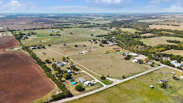 birds eye view of property featuring a rural view