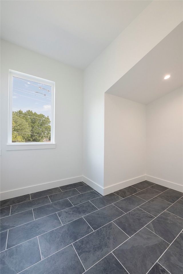 view of tiled spare room