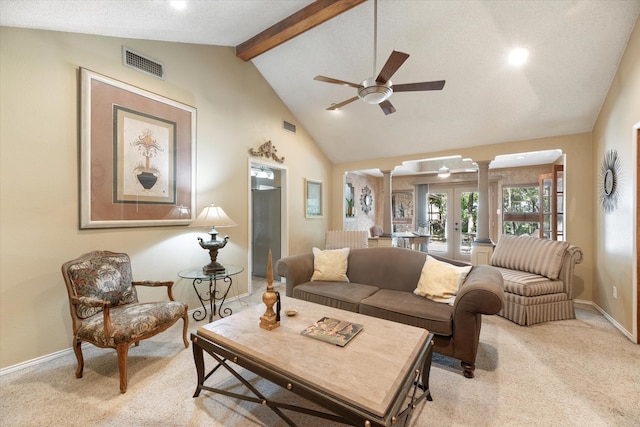 living room with french doors, light colored carpet, vaulted ceiling with beams, and ceiling fan