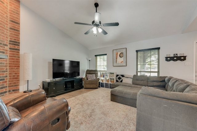 living room featuring ceiling fan and lofted ceiling