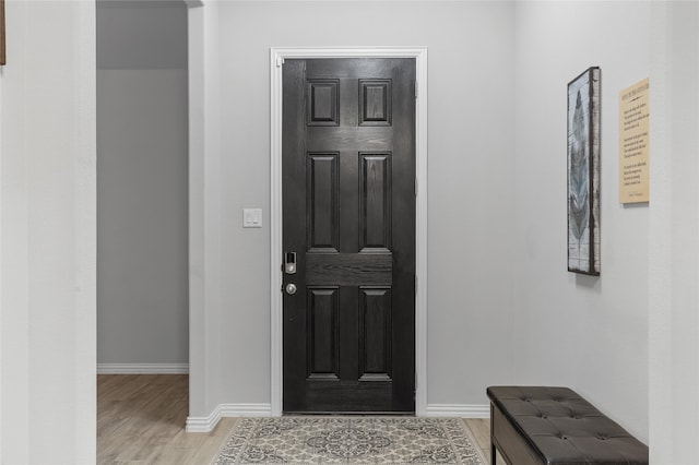 foyer with light hardwood / wood-style floors