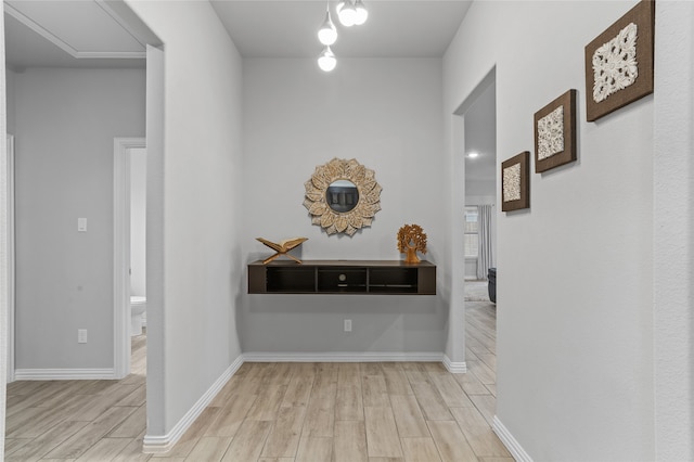 hallway with light wood-type flooring