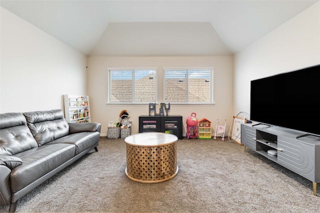 living room featuring carpet flooring and lofted ceiling