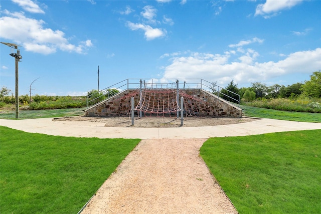 view of play area with a yard