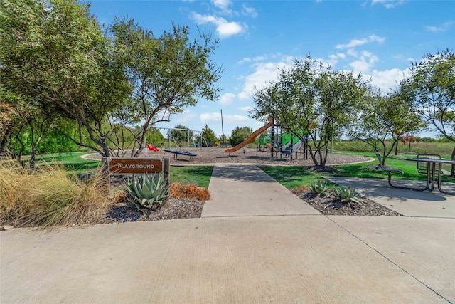 view of home's community with a playground