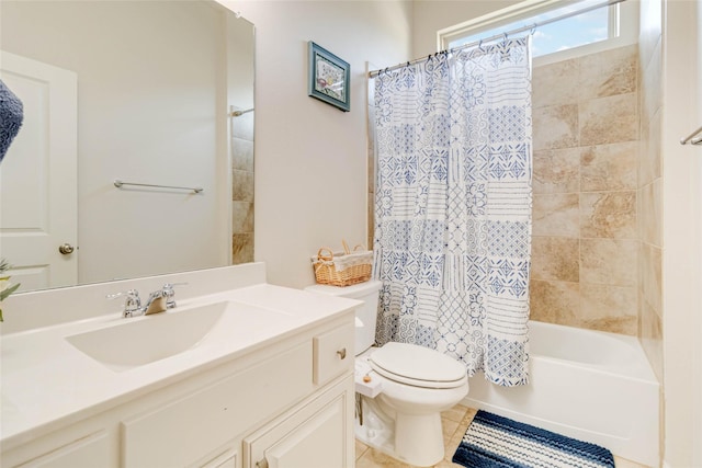 full bathroom featuring tile patterned flooring, vanity, toilet, and shower / tub combo with curtain