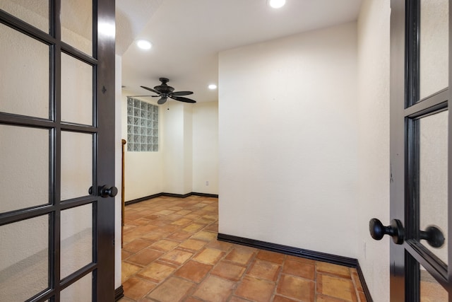 empty room featuring ceiling fan