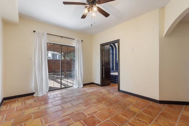 unfurnished room featuring ceiling fan