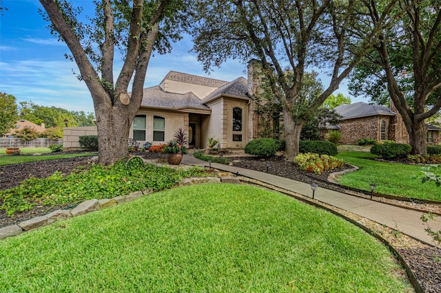 view of front of house with a front lawn