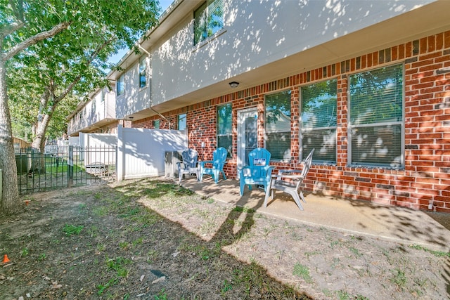 rear view of property with a patio area