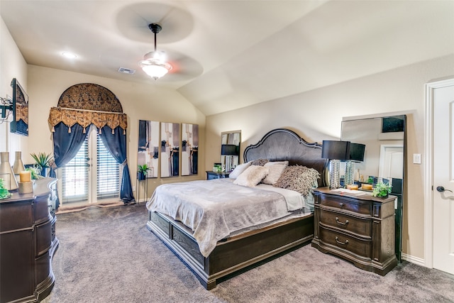 carpeted bedroom featuring ceiling fan and lofted ceiling