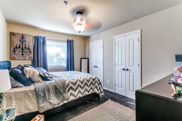 carpeted bedroom featuring ceiling fan